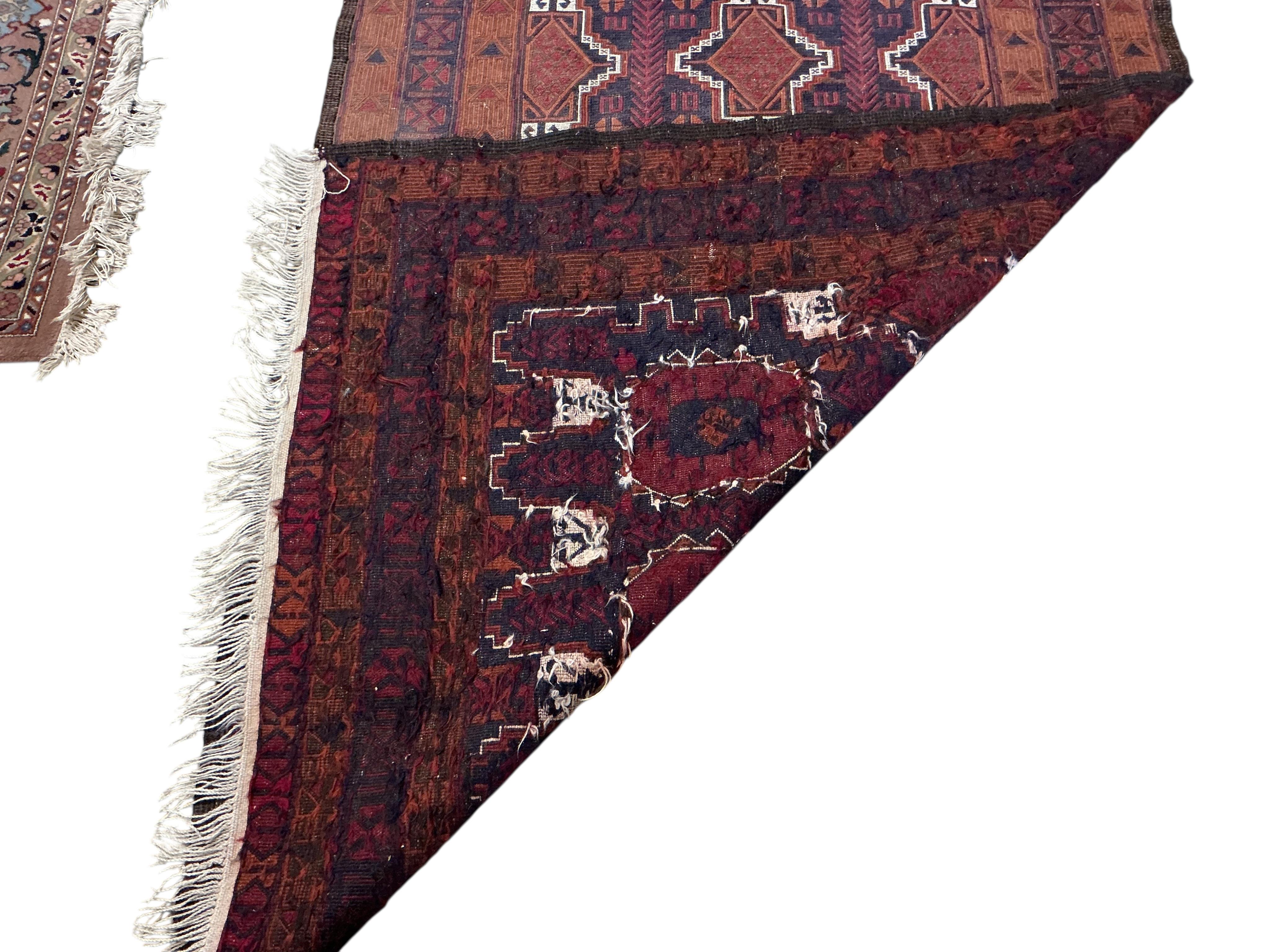 An Afghan red ground rug, a Kilim rug and a Caucasian rug, largest approx. 200 x 110cm